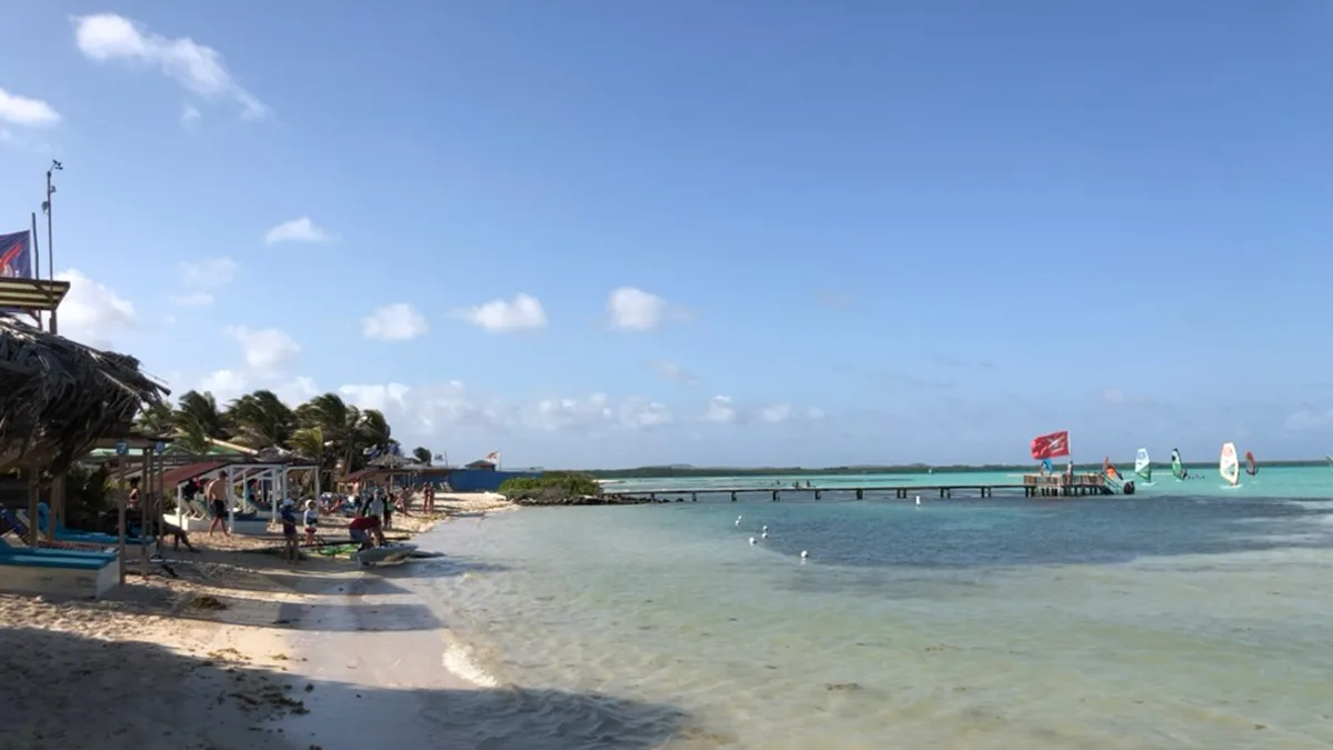 lac bay with beach shacks