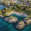 curacao resort with blue water and palm trees