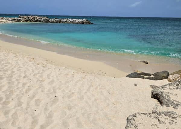 beach in st maarten with blue water