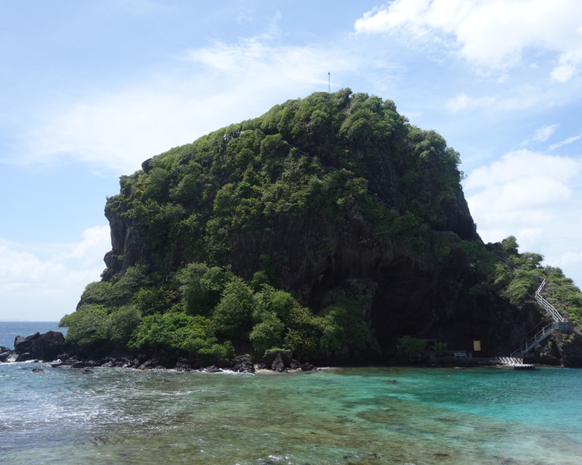 young island green hill in water